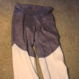 Pink and purple champion leggings that are XS size